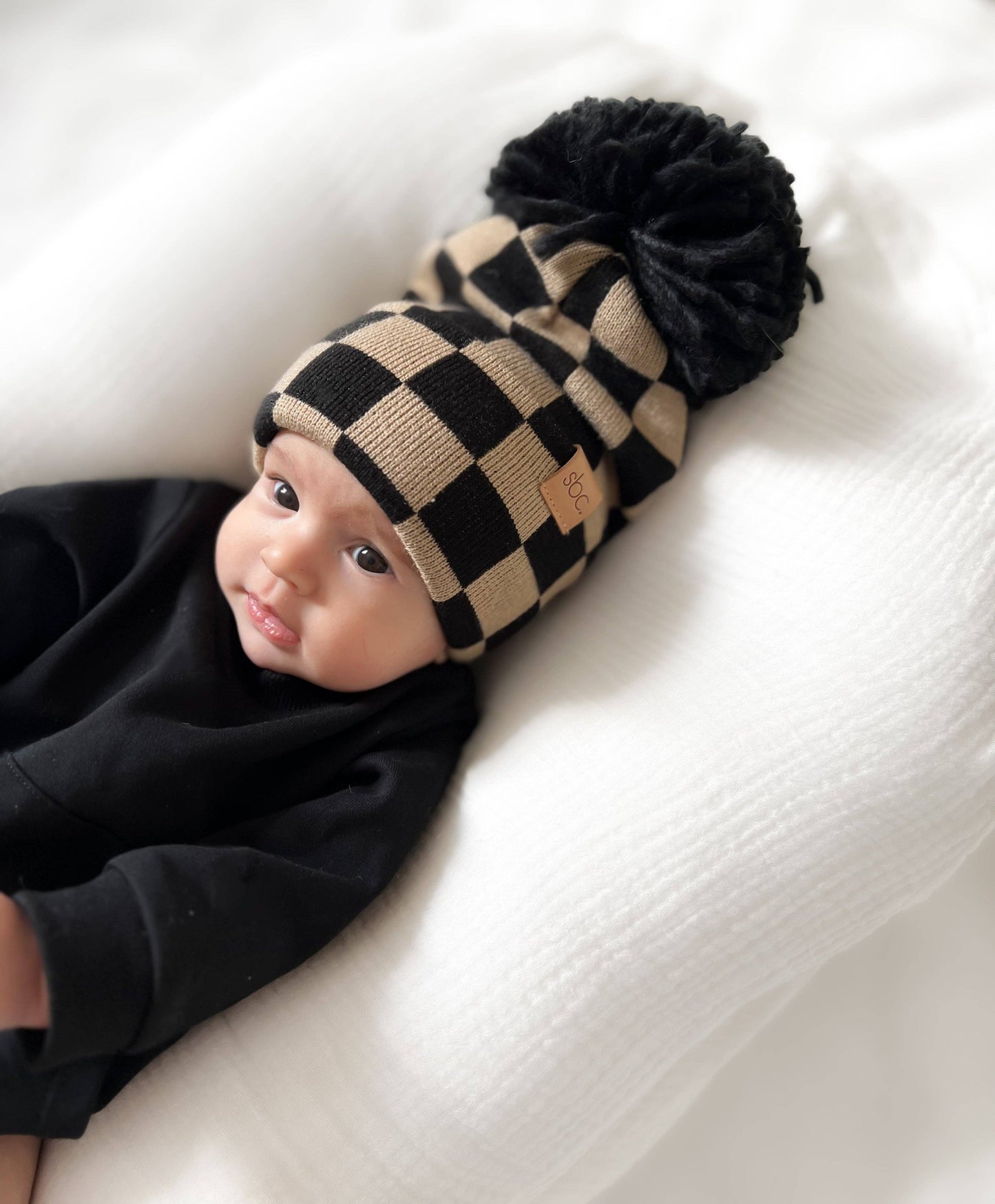 The Newborn Beanie — Black + Mocha Checkered: With Pom Pom