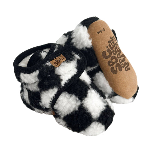 The Newborn Sherpa Bootie — Black + White Checkered